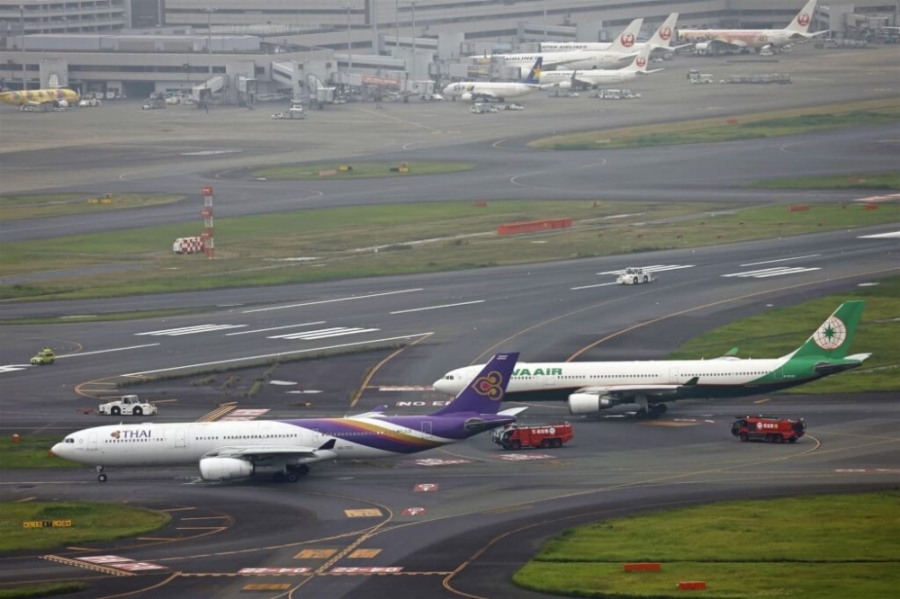 日本东京羽田机场周六发生长荣航空航机与泰国航空航机碰撞意外,已知两机分别搭载207人及264人,暂未传出有人受伤。-共同社- 日本东京羽田机场周六发生长荣航空航机与泰国航空航机碰撞意外,已知两机分别搭载207人及264人,暂未传出有人受伤。-共同社-