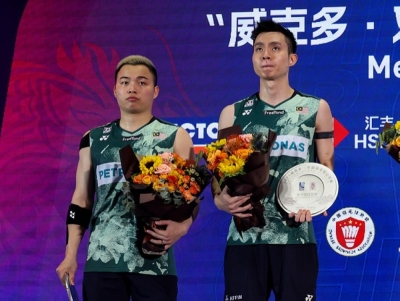 苏伟译(右)为在中国公开赛决赛的糟糕表现,在IG发文向所有大马球迷道歉。-摘自马羽总脸书- 苏伟译(右)为在中国公开赛决赛的糟糕表现,在IG发文向所有大马球迷道歉。-摘自马羽总脸书-