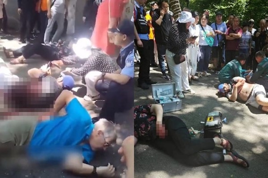 网上流传的影片显示,至少3名外国人受伤倒地,其中一人身上佈满血迹,另一名男子用手按住背部。-图截取自抖音- 网上流传的影片显示,至少3名外国人受伤倒地,其中一人身上佈满血迹,另一名男子用手按住背部。-图截取自抖音-