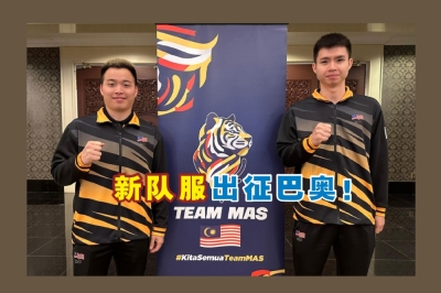 大马前男双世冠谢定峰/苏伟译,穿上展示老虎条纹变大和“更有气势”的新版本大马巴黎奥运会代表团队服。-摘自大马奥理会官网/精彩大马制图- 大马前男双世冠谢定峰/苏伟译,穿上展示老虎条纹变大和“更有气势”的新版本大马巴黎奥运会代表团队服。-摘自大马奥理会官网/精彩大马制图-