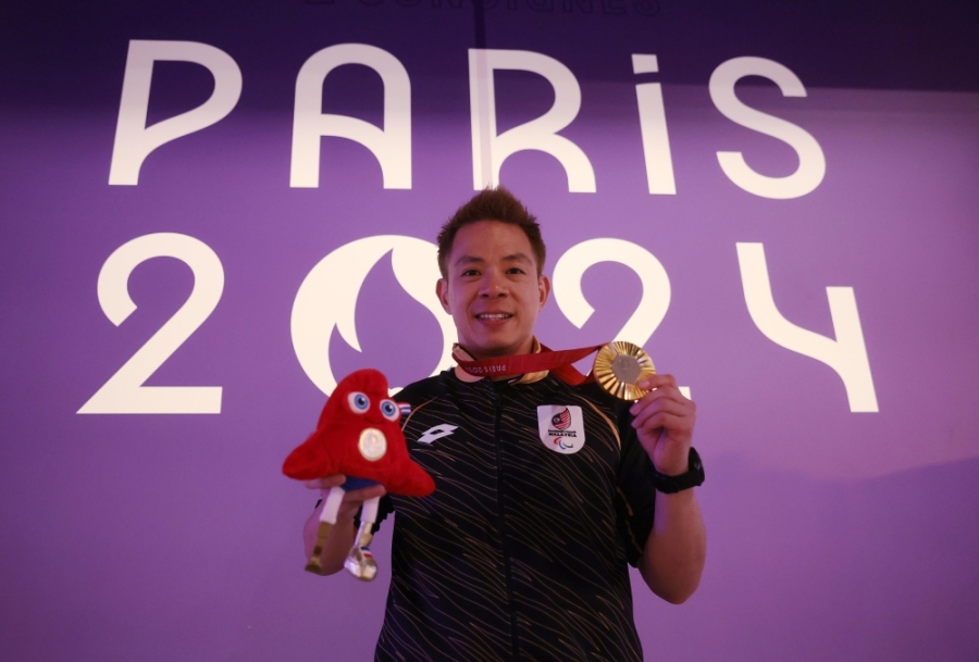 安华以及众多部长纷纷祝贺谢儮好为我国夺得残奥会男单金牌。-马新社- 安华以及众多部长纷纷祝贺谢儮好为我国夺得残奥会男单金牌。-马新社-