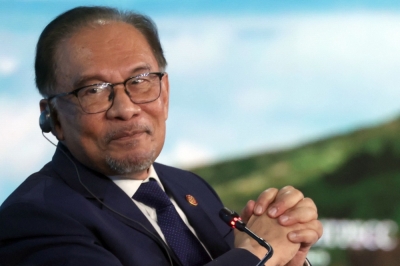 安华认为,各国必须减少对美元的依赖,而金砖国组织就是一个重要的工具。-法新社- 安华认为,各国必须减少对美元的依赖,而金砖国组织就是一个重要的工具。-法新社-