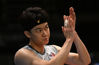 李梓嘉的世界排位上升,成为世界第三佳男单选手。-法新社- 李梓嘉的世界排位上升,成为世界第三佳男单选手。-法新社-