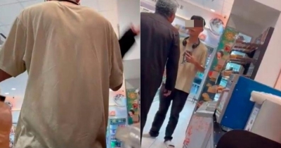 视频显示,华裔男子在便利商店内遭大叔吆喝和掌掴。-图撷取自X平台视频- 视频显示,华裔男子在便利商店内遭大叔吆喝和掌掴。-图撷取自X平台视频-