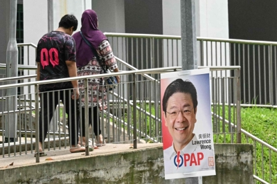 新加坡将于5月3日举行大选,这是黄循财自担任总理以来,首次率领人民行动党出征大选。-法新社- 新加坡将于5月3日举行大选,这是黄循财自担任总理以来,首次率领人民行动党出征大选。-法新社-