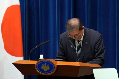 日本首相石破茂周日在首相官邸召开记者会,宣布辞去自民党总裁一职。-法新社- 日本首相石破茂周日在首相官邸召开记者会,宣布辞去自民党总裁一职。-法新社-
