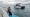 Efectivos de la Fuerza Naval lazan embarcación accidenteda en la costa de La Libertad. Foto FA