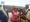 La ministre de la Santé et de la Lutte contre le Sida tenant la clé de l'ambulance en compagnie du député de Songon et du gouverneur du District d'Abidjan