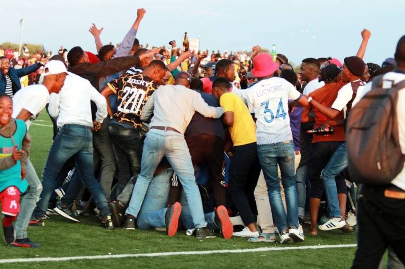 SERIOUS OFFENCE...Invasion of the pitch by fans after the match is a serious offence that might lead to the nation charged by CAF