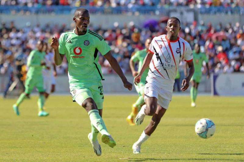 Tapelo Xoki of Orlando Pirates is challenged by Thabang Vicent Sesinyi of Jwaneng Galaxy during the CAF Champions League 2023/24 game between Jwaneng Galaxy and Orlando Pirates at the Botswana National Stadium in Gaborone, Botswana on 17 September 2023 - Photo by Icon sport