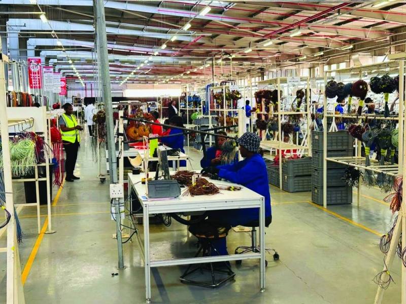 Delta Automotive workers at work