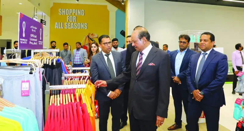 LuLu Group chairman Yusufali M A looks at some of the official FIFA World Cup items available in the hypermarket.