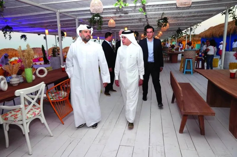 HE Akbar al-Baker (right) with Eng. Badr al-Meer at the opening of West Bay Beach, B12 Beach Club, and Doha Sands at West Bay yesterday. PICTURE: QT