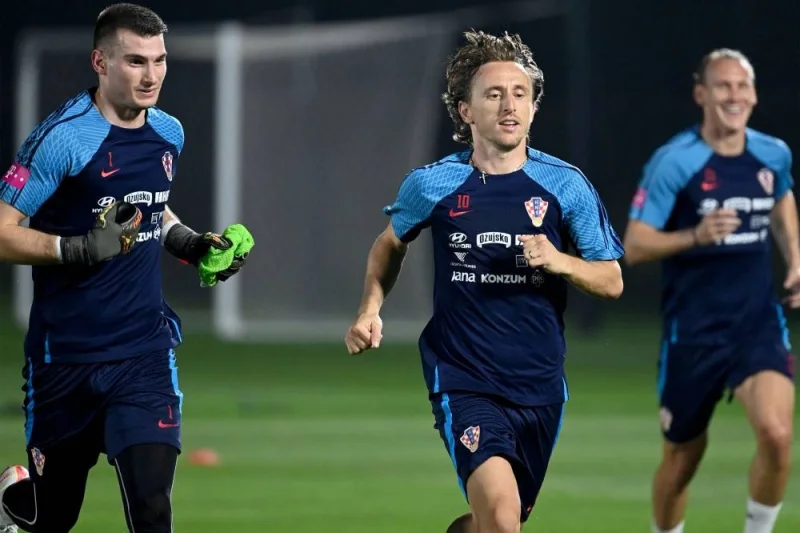 Croatia&#039;s goalkeeper Dominik Livakovic (L) and Croatia&#039;s midfielder Luka Modric take part in a training session ahead of the Qatar 2022 World Cup football tournament. (AFP)
