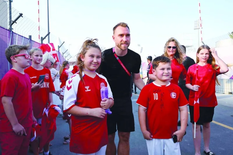 Denmark&#039;s midfielder Christian Eriksen meets with fans at Al Sailiya SC in Doha yesterday. (AFP)