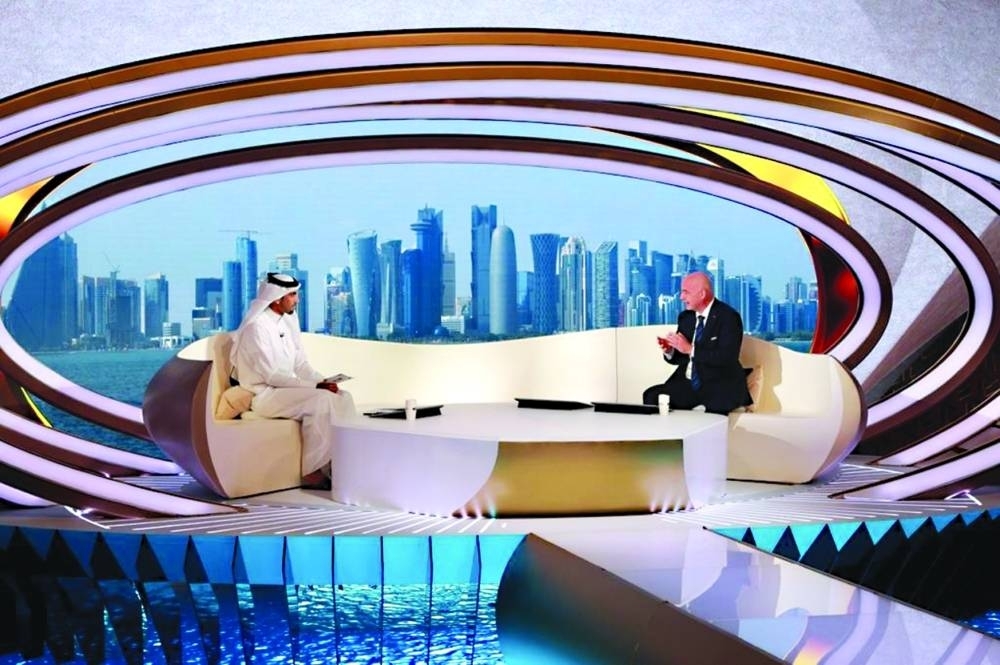 Presenter Mohamed Saadon al-Kuwari with FIFA President Gianni Infantino during the interview.