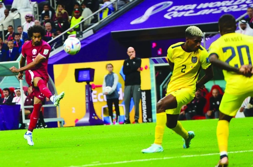 Qatar&#039;s Akram drills a shot towards the Ecuador goal in the opening match of the FIFA World Cup Qatar 2022 at Al Bayt Stadium Sunday.