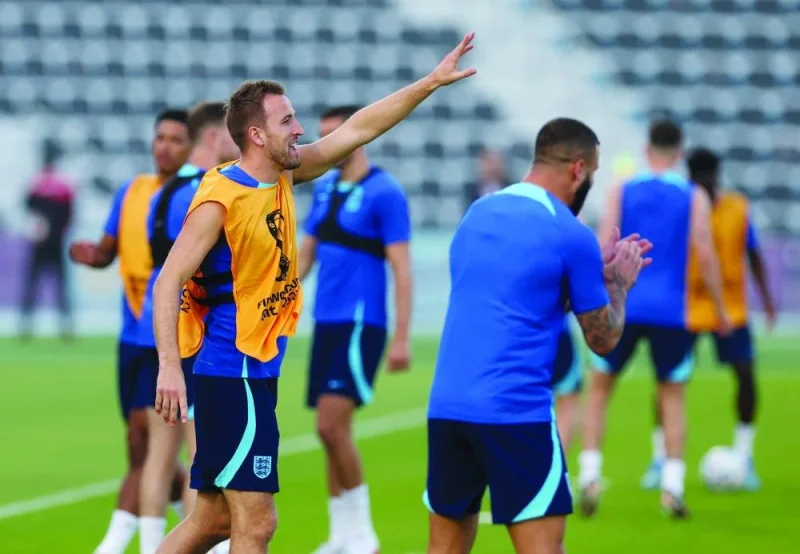 England’s forward Harry Kane takes part in a training session at the Al Wakrah Stadium on the eve of the Qatar 2022 World Cup Group B match against Iran. (AFP)