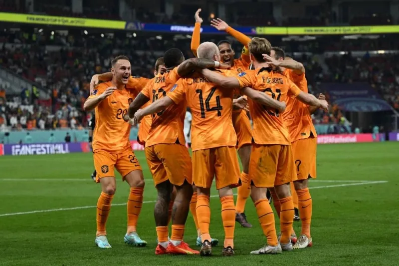 Netherlands&#039; midfielder #14 Davy Klaassen celebrates after he scored during the Qatar 2022 World Cup Group A football match between Senegal and the Netherlands at the Al-Thumama Stadium in Doha.
