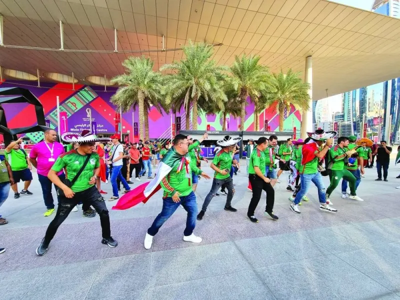 Mexican supporters entertain the crowd outside the DECC Tuesday. PICTURES Joey Aguilar
