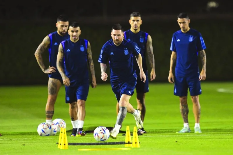 Argentina’s forward Lionel Messi (centre) takes part in a training session at the Qatar University training site in Doha yesterday, on the eve of the Qatar 2022 World Cup match against Mexico. (AFP)