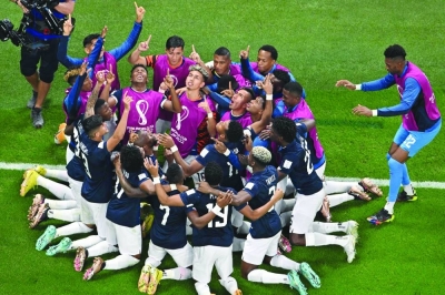 Ecuador’s Enner Valencia (C) celebrates with teammates after scoring against Netherlands. (Reuters)