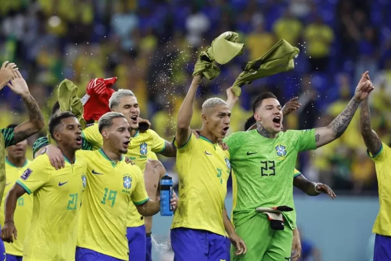  Brazil&#039;s Richarlison and Ederson celebrates after the match. REUTERS