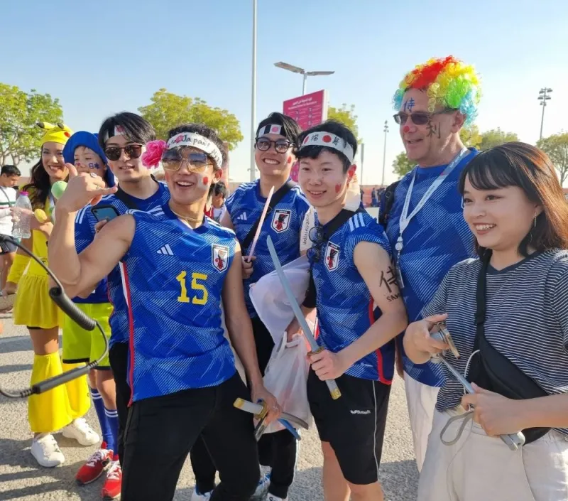 Taka with compatriots and other football fans.