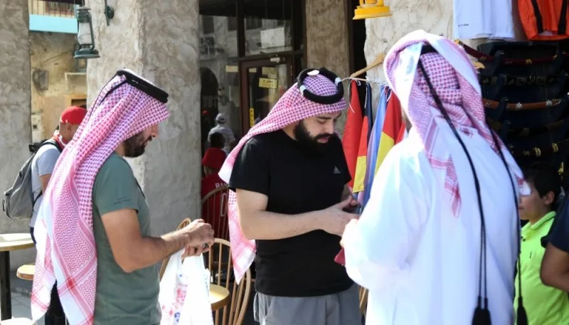 A lot of football fans from various countries, attending the FIFA World Cup Qatar 2022, are wearing the Arab headdress. PICTURES: Thajudheen, Shaji Kayamkulam, Shemeer Rasheed.