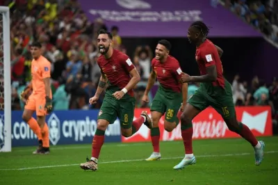 Portugal&#039;s midfielder Bruno Fernandes (right) celebrates after scoring against Uruguay during the Qatar 2022 Group H at the Lusail Stadium. PICTURE: Ramchand