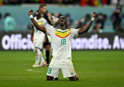 Senegal&#039;s Ismaila Sarr celebrates qualifying for the knockout stages. REUTERS