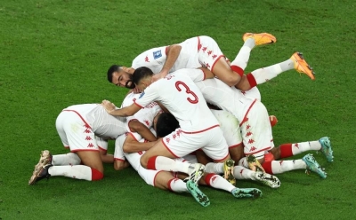 Tunisia players celebrate after Wahbi Khazri scores their first goal. REUTERS