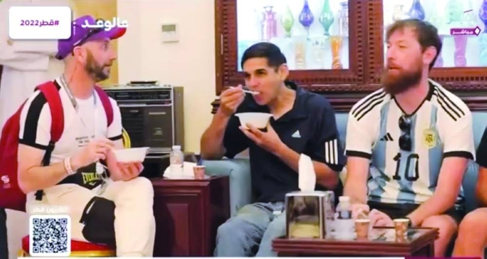 Football fans in a Qatari majlis (screengrabs from Qatar TV)