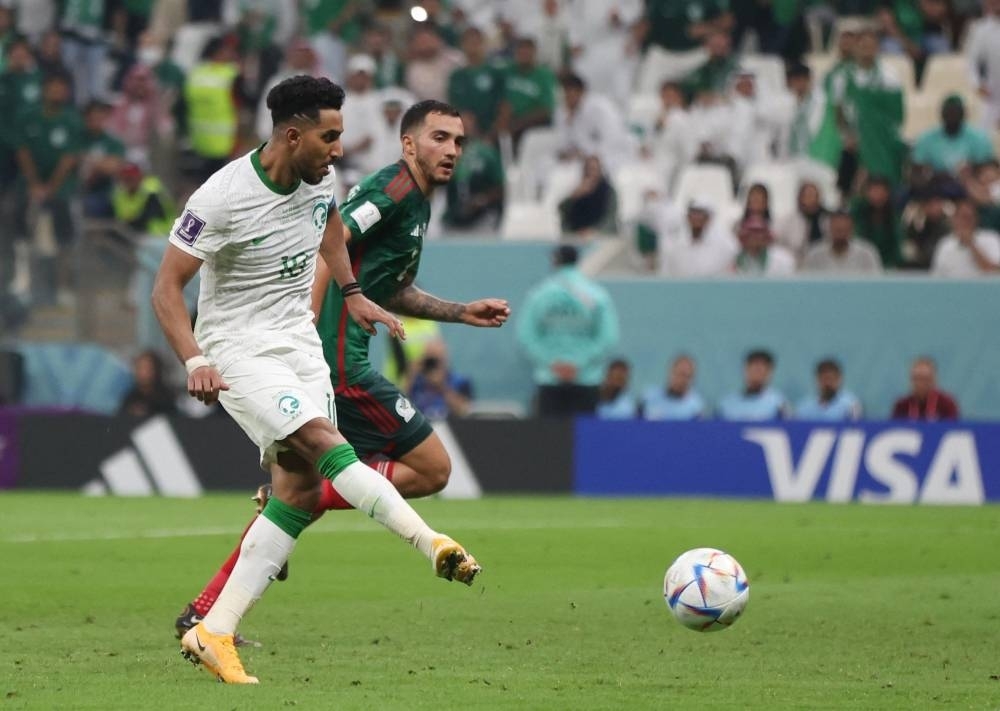  Saudi Arabia&#039;s Salem Al-Dawsari scores their first goal. REUTERS