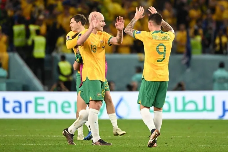Australia&#039;s forward #09 Jamie Maclaren celebrate after they won the Qatar 2022 World Cup Group D football match between Australia and Denmark at the Al-Janoub Stadium in Al-Wakra
