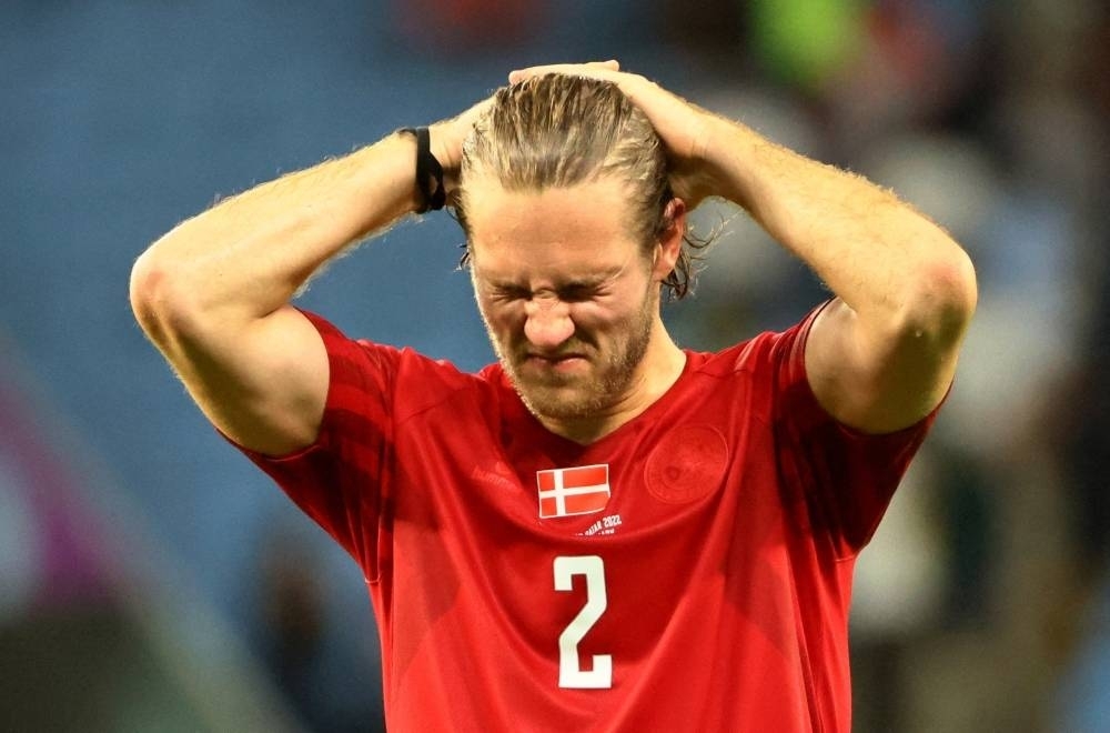 Denmark&#039;s Joachim Andersen looks dejected after being eliminated from the World Cup.