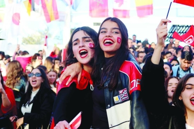 Tunisia fans celebrate during the match at the fan zone in Tunis.