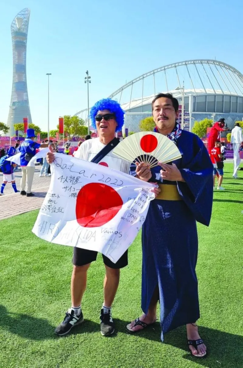 A Japan team supporter in a traditional costume before a match.