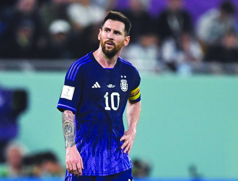 Soccer Football - FIFA World Cup Qatar 2022 - Group C - Poland v Argentina - Stadium 974, Doha, Qatar - November 30, 2022 Argentina's Lionel Messi reacts REUTERS/Dylan Martinez