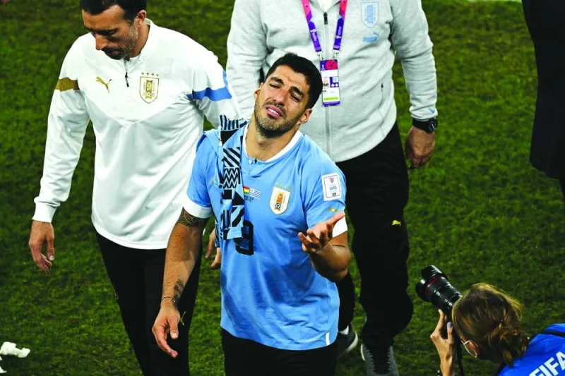 TOPSHOT - Uruguay's forward #09 Luis Suarez reacts at the end of the Qatar 2022 World Cup Group H football match between Ghana and Uruguay at the Al-Janoub Stadium in Al-Wakrah, south of Doha on December 2, 2022. (Photo by Philip FONG / AFP)