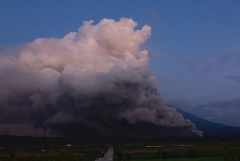 TOPSHOT - Mount Semeru spews smoke and ash in Lumajang on December 4, 2022. 