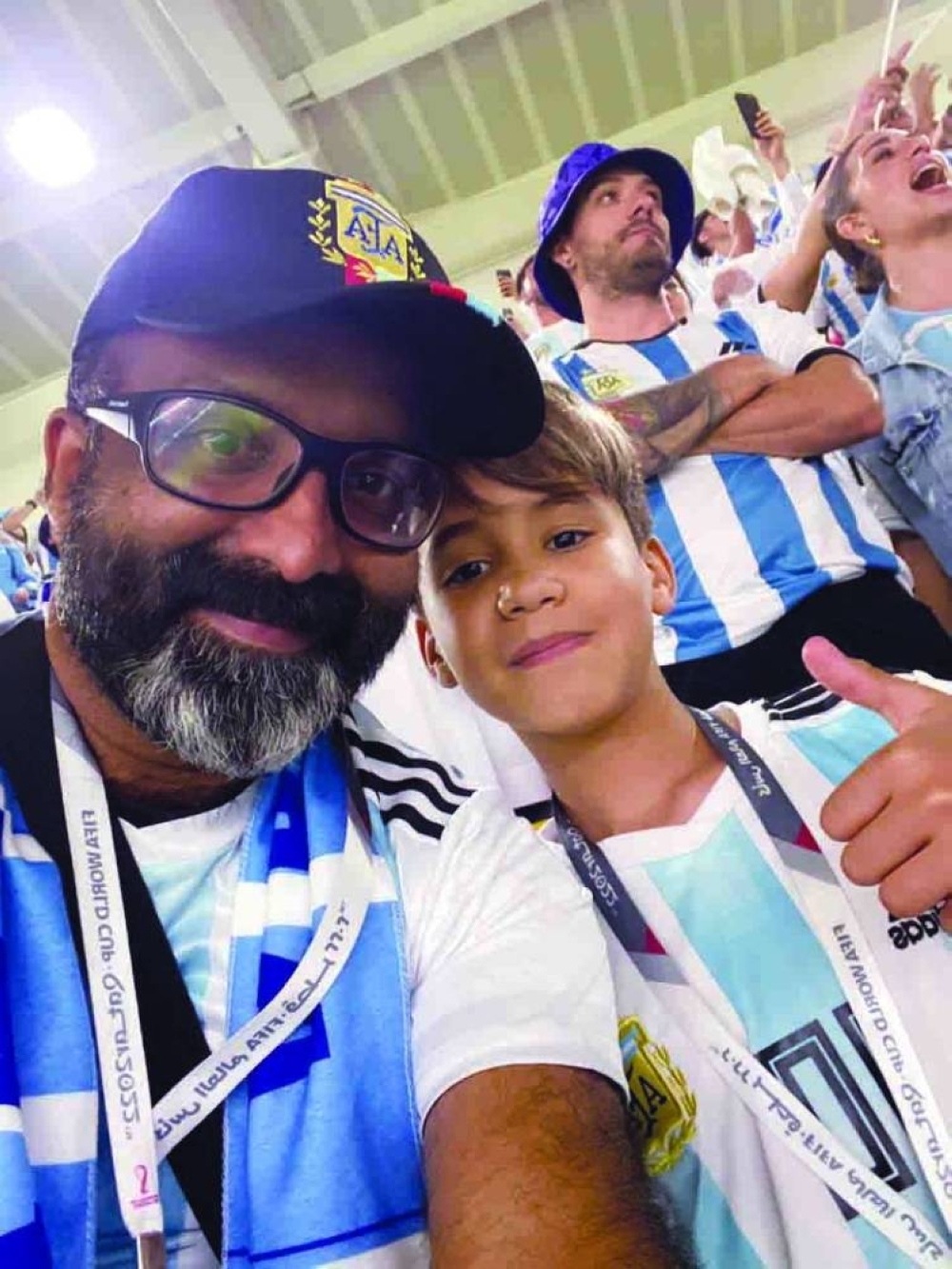 Ravi Jose Thanickal with some Argentine fans at Ahmed Bin Ali Stadium.