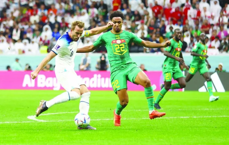 England's Harry Kane scores their second goal against Senegal at Al Bayt Stadium in Al Khor yesterday. (Reuters)
