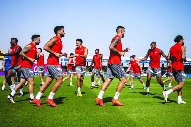 Switzerland’s players are seen during a team training session at the University of Doha for Science and Technology training facilities yesterday. (AFP)