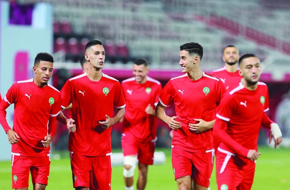 Morocco’s players attend a training session at the Al Duhail SC Stadium in Doha on the eve of the Qatar 2022 World Cup Round of 16 match against Spain. Morocco are the lone Arab nation and the last African team remaining in the knockout stages of the tournament. (AFP)