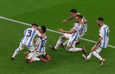 Argentina&#039;s Lautaro Martinez celebrates with teammates after scoring the winning spot kick in the penalty shootout against Netherlands at Lusail Stadium. Reuters