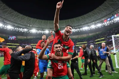 Morocco&#039;s Achraf Dari and Morocco&#039;s Walid Cheddira celebrate after the match as Morocco progress to the semi finals. REUTERS