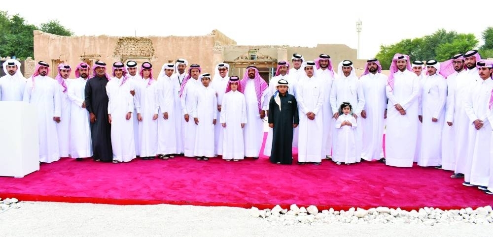 Al Khater family members along with HE Dr Hamad bin Abdelaziz al-Kawari.