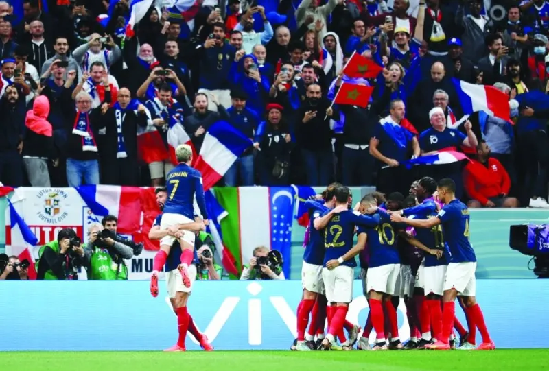 France’s Olivier Giroud celebrates scoring their second goal with teammates. (Reuters)