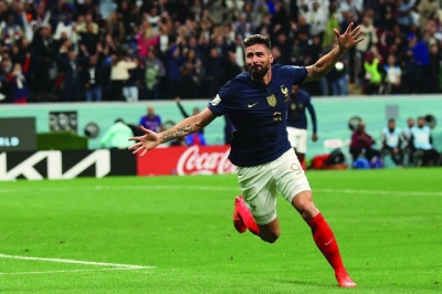 France’s Olivier Giroud celebrates scoring his team’s second goal during the Qatar 2022 quarter-final against England at the Al Bayt Stadium yesterday. (AFP)